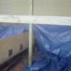 Before while tarping project for containment of media.