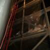 Inside an Air Filter House on back side of filters at Power Plant.  Rusty structural steel and peeling paint needed to be ground down, primed with a penetrating moisture cure primer and then coated with a durable high solids low VOC epoxy.